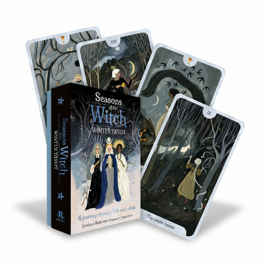 Tarot cards titled 'Seasons of the Witch' on a textured white surface