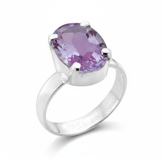 Amethyst Faceted Oval Claw Set Ring in Silver
