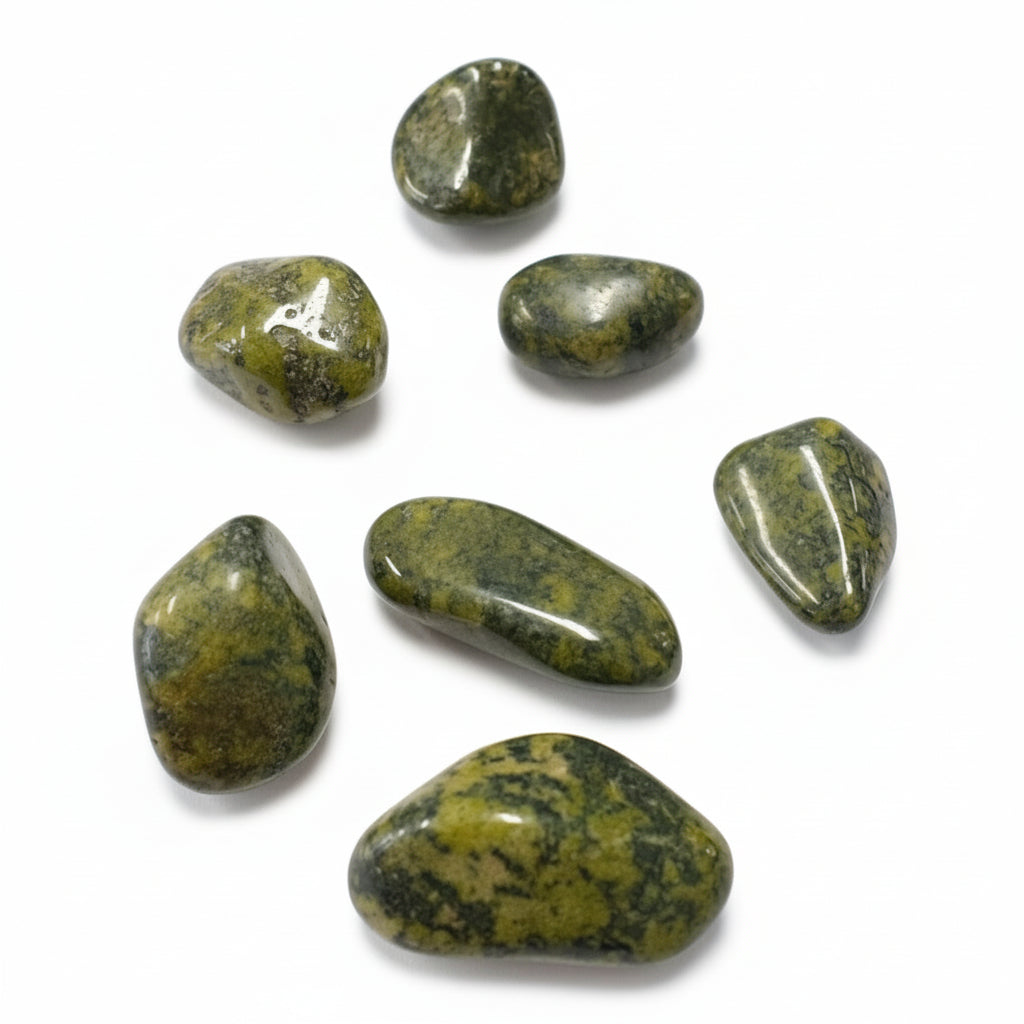 Green and brown stones on a white background