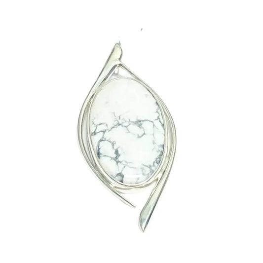 A silver-colored oval pendant featuring a howlite stone with a white and grey marbled pattern.